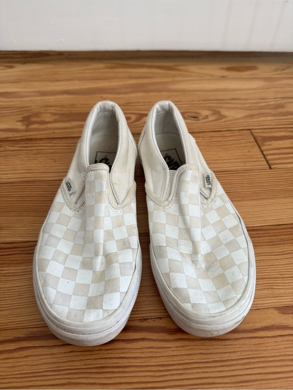Vans Slip-On Checkerboard Sneakers in Cream and White